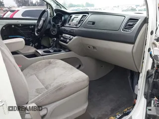2016 Kia Sedona L with VIN KNDMA5C12G6151168, listed as a IAAI auction lot 42117087 with 99,743 mi miles. Bid and sale history available at carsss.com. Image 5.