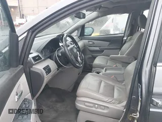 2016 Honda Odyssey EX-L z VIN 5FNRL5H65GB060131, wystawiony jako IAAI lot #41456273 z przebiegiem 134 620 mil mil oraz . Historia ofert i sprzedaży dostępna na DreamBid. Obrazek 5.