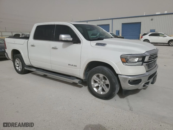 2021 Ram 1500 Laramie with VIN 1C6SRFJT5MN809584, listed as a Copart auction lot 49048035 with 69,411 mi miles and Salvage Title. Bid and sale history available at carsss.com. Image 4.