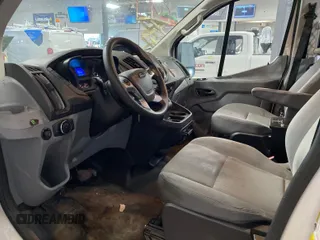 2018 Ford Transit with VIN 1FTYR1YGXJKA49048, listed as a IAAI auction lot 42843478 with 99,161 mi miles and . Bid and sale history available at DreamBid. Image 3.