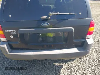 2003 Ford Escape XLT Popular 2 с VIN 1FMYU93113KC18744, выставлен на аукционе IAAI как лот 42027721 с пробегом 234 338 миль миль и . История ставок и продаж доступна на DreamBid. Изображение 6.