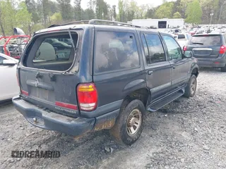 1999 Mercury Mountaineer z VIN 4M2DU52P3XUJ37055, wystawiony jako IAAI lot #41940577 z przebiegiem 218 702 mil mil oraz . Historia ofert i sprzedaży dostępna na DreamBid. Obrazek 4.