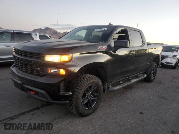 2021 Chevrolet Silverado 1500 Custom Trail Boss with VIN 3GCPYCEF6MG104130, listed as a Copart auction lot 82775624 with 62,408 mi miles and Salvage Title. Bid and sale history available at DreamBid. Image 1.