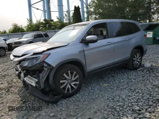 2020 Honda Pilot EX-L z VIN 5FNYF6H5XLB008097, wystawiony jako Copart lot #59329285 z przebiegiem Nie podano mil oraz Szkoda całkowita • Salvage title. Historia ofert i sprzedaży dostępna na DreamBid. Obrazek 1.