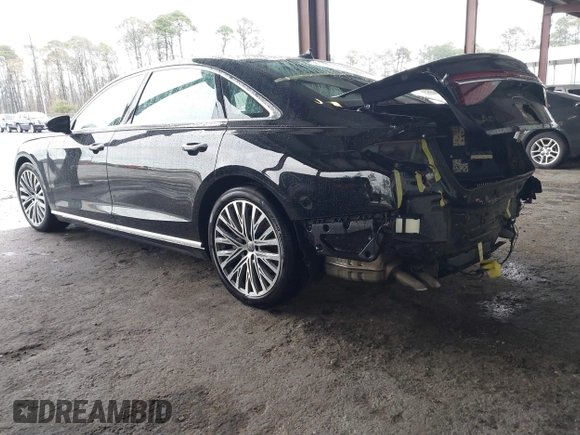 2019 Audi A8 L with VIN WAU8DAF8XKN013139, listed as a IAAI auction lot 41662195 with 38,442 mi miles. Bid and sale history available at carsss.com. Image 3.