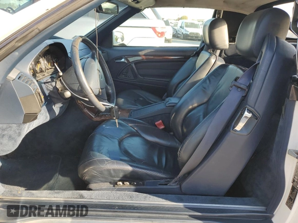 1999 Mercedes-Benz SL-Class with VIN WDBFA68F3XF183399, listed as a Copart auction lot 76908024 with 136,337 mi miles and Salvage Title. Bid and sale history available at carsss.com. Image 7.