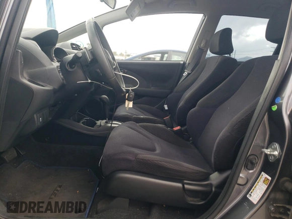 2013 Honda Fit Sport z VIN JHMGE8H63DC046822, wystawiony jako Copart lot #54490275 z przebiegiem 93 678 mil mil oraz Szkoda całkowita • Salvage title. Historia ofert i sprzedaży dostępna na DreamBid. Obrazek 7.