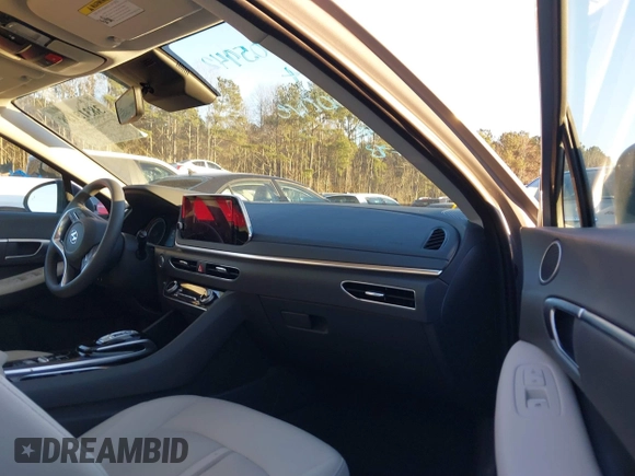 2023 Hyundai Sonata SEL z VIN KMHL64JA1PA321006, wystawiony jako IAAI lot #38313188 z przebiegiem 12 619 mil mil oraz . Historia ofert i sprzedaży dostępna na DreamBid. Obrazek 5.