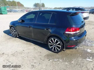 2014 Volkswagen GTI Driver's Edition with VIN WVWHD7AJXEW011230, listed as a IAAI auction lot 41600806 with 124,498 mi miles. Bid and sale history available at carsss.com. Image 3.