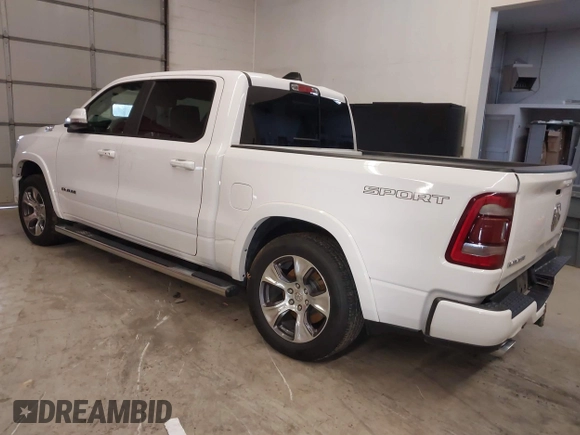 2021 Ram 1500 Laramie with VIN 1C6SRFJT6MN671456, listed as a IAAI auction lot 41087757 with 40,593 mi miles and . Bid and sale history available at DreamBid. Image 3.