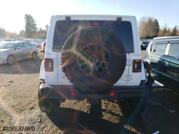 2019 Jeep Wrangler Unlimited Rubicon with VIN 1C4HJXFN5KW547244, listed as a Copart auction lot 88947665 with 77,853 mi miles and Salvage Title. Bid and sale history available at carsss.com. Image 6.