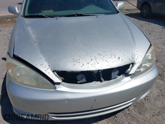 2003 Toyota Camry LE with VIN 4T1BE32K03U135482, listed as a IAAI auction lot 42145175 with 172,725 mi miles and . Bid and sale history available at DreamBid. Image 6.