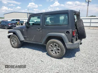 2017 Jeep Wrangler Rubicon with VIN 1C4BJWCG0HL675472, listed as a Copart auction lot 62751365 with 86,338 mi miles and Salvage title. Bid and sale history available at DreamBid. Image 2.