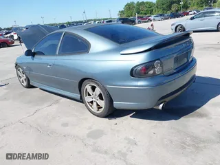 2006 Pontiac GTO with VIN 6G2VX12U66L811744, listed as a IAAI auction lot 41988486 with 81,893 mi miles. Bid and sale history available at carsss.com. Image 3.