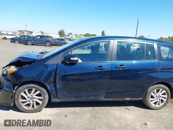 2014 Mazda 5 Sport with VIN JM1CW2BLXE0175975, listed as a IAAI auction lot 40278614 with 102,430 mi miles and . Bid and sale history available at DreamBid. Image 14.