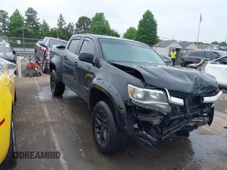 2018 Chevrolet Colorado 2WD LT z VIN 1GCGSCEN7J1133493, wystawiony jako IAAI lot #42289861 z przebiegiem 128 244 mil mil oraz . Historia ofert i sprzedaży dostępna na DreamBid. Obrazek 1.