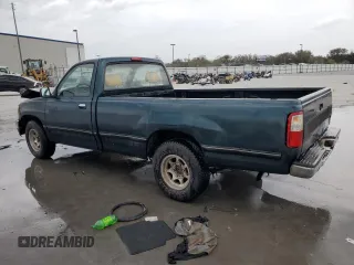 1994 Toyota T100 DX with VIN JT4VD10A6R0017701, listed as a Copart auction lot 46034975 with 219,651 mi miles and Salvage Title. Bid and sale history available at DreamBid. Image 2.