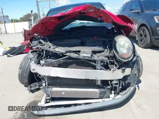 2017 MINI Hardtop 4 Door Cooper z VIN WMWXU1C57H2E18670, wystawiony jako IAAI lot #41950314 z przebiegiem 94 199 mil mil oraz . Historia ofert i sprzedaży dostępna na DreamBid. Obrazek 13.