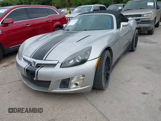 2008 Saturn Sky Red Line z VIN 1G8MG35X98Y101663, wystawiony jako IAAI lot #42357500 z przebiegiem 148 165 mil mil oraz . Historia ofert i sprzedaży dostępna na DreamBid. Obrazek 2.