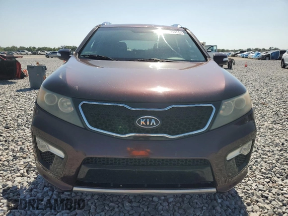 2011 Kia Sorento SX z VIN 5XYKW4A29BG127342, wystawiony jako Copart lot #57291455 z przebiegiem 291 922 mil mil oraz Czysty tytuł • Clean title. Historia ofert i sprzedaży dostępna na DreamBid. Obrazek 5.