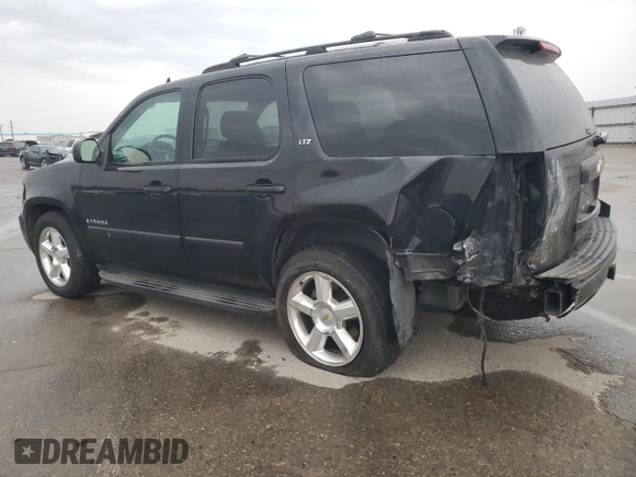 2007 Chevrolet Tahoe LTZ with VIN 1GNFC13067R267773, listed as a Copart auction lot 41653905 with 197,538 mi miles and Salvage title. Bid and sale history available at DreamBid. Image 2.