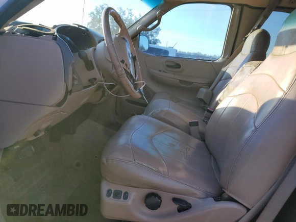 1999 Ford F-150 with VIN 2FTRX18W4XCA10583, listed as a Copart auction lot 44982655 with Not provided miles and Salvage title. Bid and sale history available at DreamBid. Image 7.