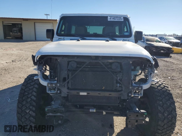 2022 Jeep Wrangler Unlimited High Tide with VIN 1C4HJXDG2NW102145, listed as a Copart auction lot 41407225 with 43,921 mi miles and Salvage Title. Bid and sale history available at DreamBid. Image 5.