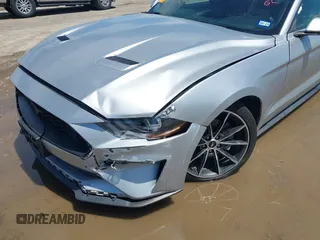 2018 Ford Mustang EcoBoost with VIN 1FA6P8THXJ5128830, listed as a IAAI auction lot 42192673 with 58,817 mi miles and . Bid and sale history available at DreamBid. Image 12.