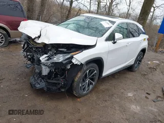 2019 Lexus RX with VIN 2T2BGMCA1KC037143, listed as a IAAI auction lot 41720474 with 101,971 mi miles. Bid and sale history available at carsss.com. Image 2.