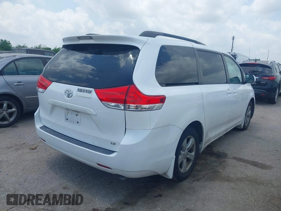 2014 Toyota Sienna LE AAS with VIN 5TDKK3DC0ES525654, listed as a IAAI auction lot 42153582 with 71,258 mi miles and . Bid and sale history available at carsss.com. Image 4.