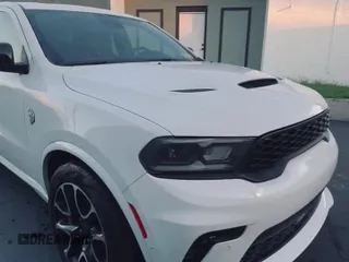 2023 Dodge Durango SRT Hellcat z VIN 1C4SDJH97PC555073, wystawiony jako Copart lot #84053825 z przebiegiem 13 331 mil mil oraz Szkoda całkowita • Salvage title. Historia ofert i sprzedaży dostępna na DreamBid. Obrazek 11.