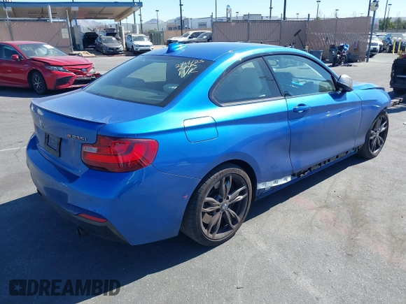 2015 BMW 2 Series M235i with VIN WBA1J7C59FV254140, listed as a IAAI auction lot 41642427 with 23,957 mi miles and . Bid and sale history available at carsss.com. Image 4.