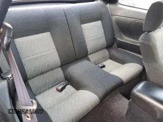 1995 Toyota Celica ST z VIN JT2AT00N7S0042443, wystawiony jako Copart lot #56394475 z przebiegiem 328 515 mil mil oraz Szkody całkowita. Historia ofert i sprzedaży dostępna na DreamBid. Obrazek 10.