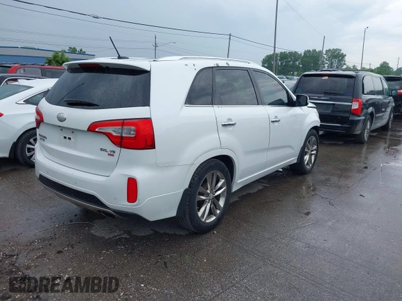 2014 Kia Sorento SX Limited with VIN 5XYKW4A75EG444230, listed as a IAAI auction lot 42540409 with 134,339 mi miles and . Bid and sale history available at DreamBid. Image 4.