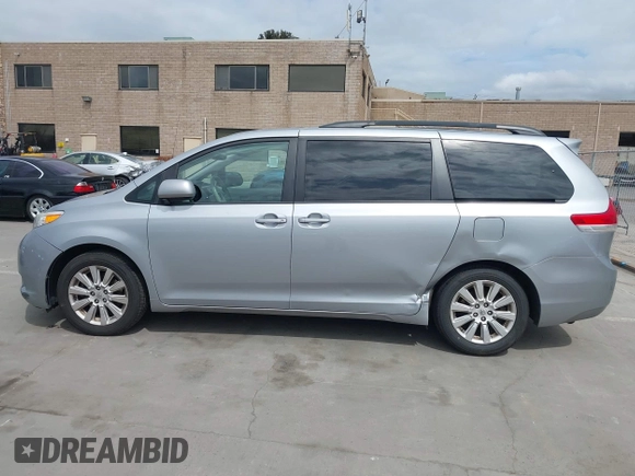 2014 Toyota Sienna LE with VIN 5TDJK3DC1ES080711, listed as a IAAI auction lot 41910679 with 118,788 mi miles and . Bid and sale history available at DreamBid. Image 14.