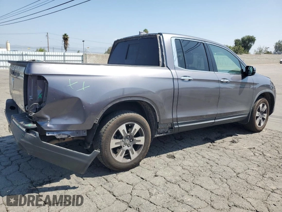 2019 Honda Ridgeline RTL-E with VIN 5FPYK3F73KB016675, listed as a Copart auction lot 55340905 with 69,571 mi miles and Salvage title. Bid and sale history available at DreamBid. Image 3.