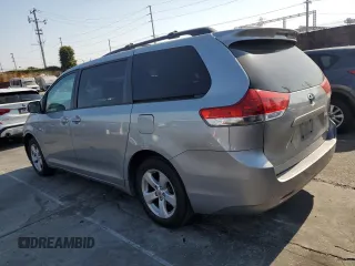 2011 Toyota Sienna LE AAS with VIN 5TDKK3DC6BS054847, listed as a Copart auction lot 64673975 with 197,266 mi miles and Salvage title. Bid and sale history available at DreamBid. Image 2.