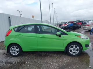 2014 Ford Fiesta SE z VIN 3FADP4EJ8EM233754, wystawiony jako IAAI lot #42108955 z przebiegiem 113 325 mil mil oraz . Historia ofert i sprzedaży dostępna na DreamBid. Obrazek 13.