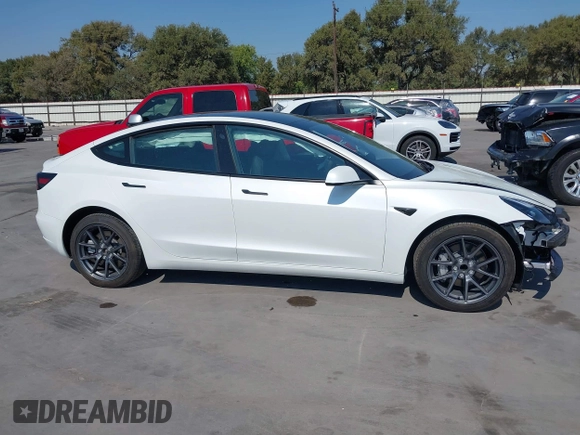 2023 Tesla Model 3 with VIN 5YJ3E1EA9PF585632, listed as a IAAI auction lot 40520993 with 7,775 mi miles and . Bid and sale history available at DreamBid. Image 14.