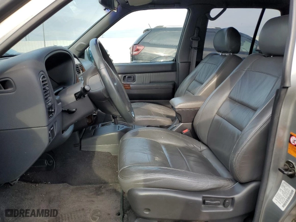 1999 Infiniti QX4 Luxury with VIN JNRAR07Y3XW064787, listed as a Copart auction lot 80981484 with 0 miles and Salvage Title. Bid and sale history available at carsss.com. Image 6.