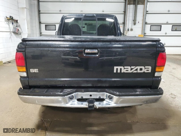 1999 Mazda B-Series 2WD Truck SX with VIN 4F4YR12C8XTM24015, listed as a Copart auction lot 89155635 with 116,466 mi miles and Clean Title. Bid and sale history available at carsss.com. Image 6.