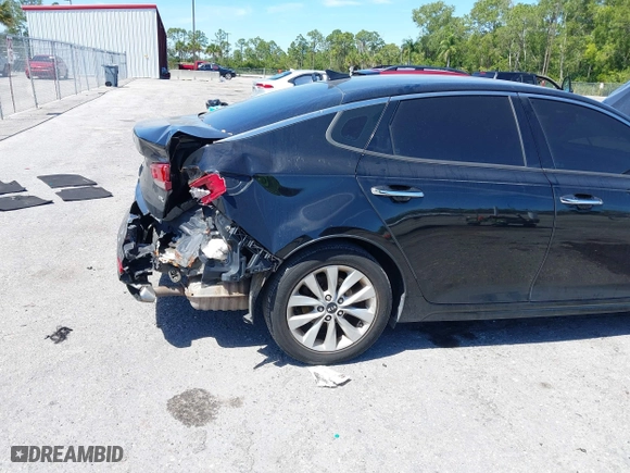 2017 Kia Optima EX with VIN 5XXGU4L35HG142807, listed as a IAAI auction lot 41856251 with 104,634 mi miles. Bid and sale history available at carsss.com. Image 18.