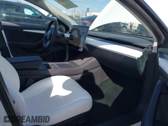 2023 Tesla Model 3 with VIN 5YJ3E1EA6PF495631, listed as a IAAI auction lot 41568118 with 10,073 mi miles and . Bid and sale history available at DreamBid. Image 5.