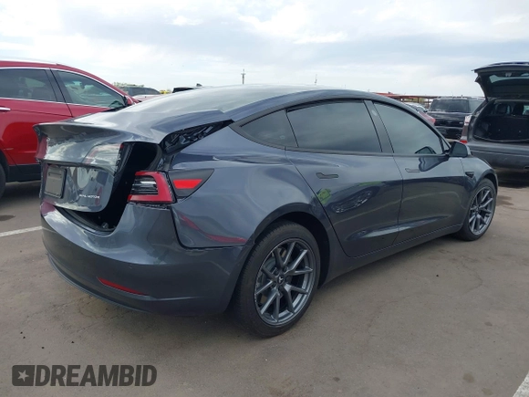 2022 Tesla Model 3 Long Range with VIN 5YJ3E1EB9NF164774, listed as a IAAI auction lot 41915755 with 39,625 mi miles and . Bid and sale history available at DreamBid. Image 4.