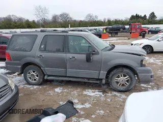 2004 Ford Expedition Special Service with VIN 1FMPU16L74LB40928, listed as a IAAI auction lot 41235243 with 233,942 mi miles. Bid and sale history available at carsss.com. Image 14.