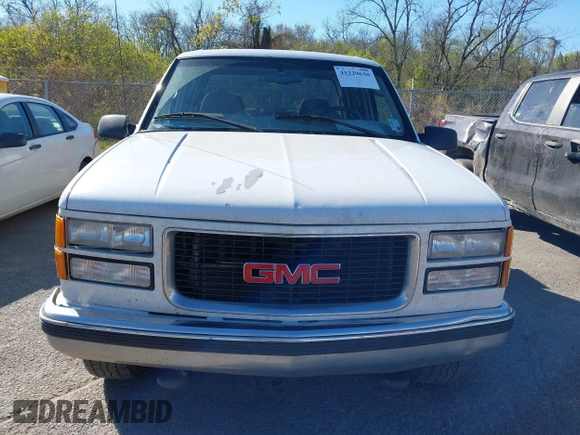 1999 GMC Sierra 3500 z VIN 1GTGC33R4XF094778, wystawiony jako IAAI lot #41229630 z przebiegiem 199 345 mil mil oraz . Historia ofert i sprzedaży dostępna na DreamBid. Obrazek 14.