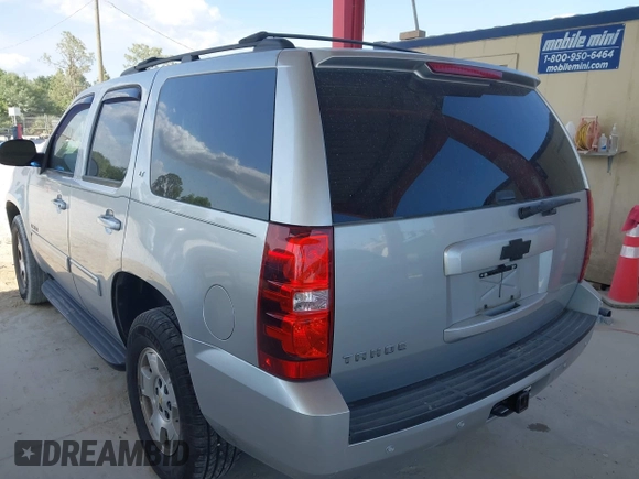 2013 Chevrolet Tahoe LT z VIN 1GNSCBE04DR238222, wystawiony jako IAAI lot #42228643 z przebiegiem 214 525 mil mil oraz . Historia ofert i sprzedaży dostępna na DreamBid. Obrazek 3.