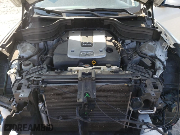2017 Infiniti QX50 z VIN JN1BJ0RR9HM409046, wystawiony jako Copart lot #53500665 z przebiegiem 136 008 mil mil oraz Szkoda całkowita • Salvage title. Historia ofert i sprzedaży dostępna na DreamBid. Obrazek 11.