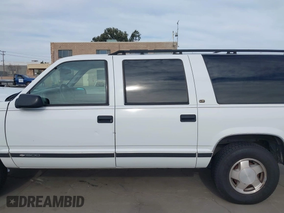 1997 Chevrolet Suburban with VIN 3GNFK16R9VG187426, listed as a IAAI auction lot 41678063 with 131,387 mi miles. Bid and sale history available at carsss.com. Image 14.
