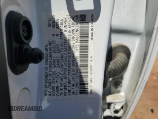 2020 Honda Civic LX z VIN 2HGFC2F64LH592299, wystawiony jako Copart lot #57040525 z przebiegiem 154 093 mil mil oraz Szkoda całkowita • Salvage title. Historia ofert i sprzedaży dostępna na DreamBid. Obrazek 13.
